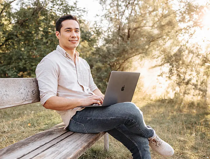 Nature view with work on laptop